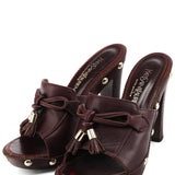 Mules à plateforme cloutée en cuir bordeaux EU 35