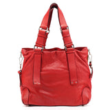 Bolso tote Patsy de piel roja con logo de tachuelas
