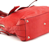 Bolso tote Patsy de piel roja con logo de tachuelas