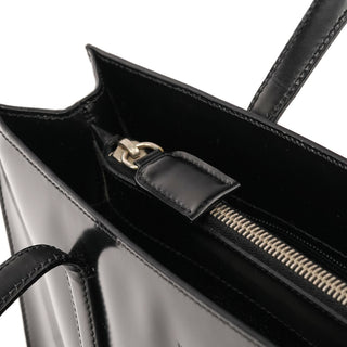 Interior of Prada Spazzolato tote with three compartments and middle zip