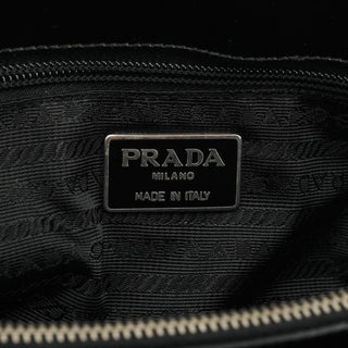 Prada Milano Made in Italy plaque inside black jacquard-lined interior
