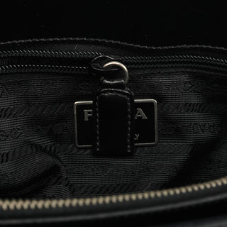 Prada logo zip pull and signature black jacquard lining