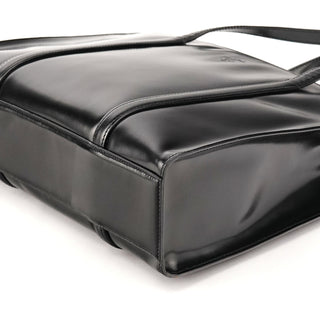 Base and corners of Prada black patent Spazzolato tote bag