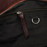 Bittersweet Schultertasche aus braunem Leder
