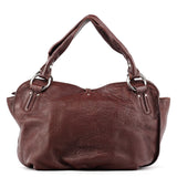 Bittersweet Schultertasche aus braunem Leder