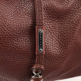 Bittersweet Schultertasche aus braunem Leder