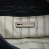 Bolso de piel azul marino con asa de rayas