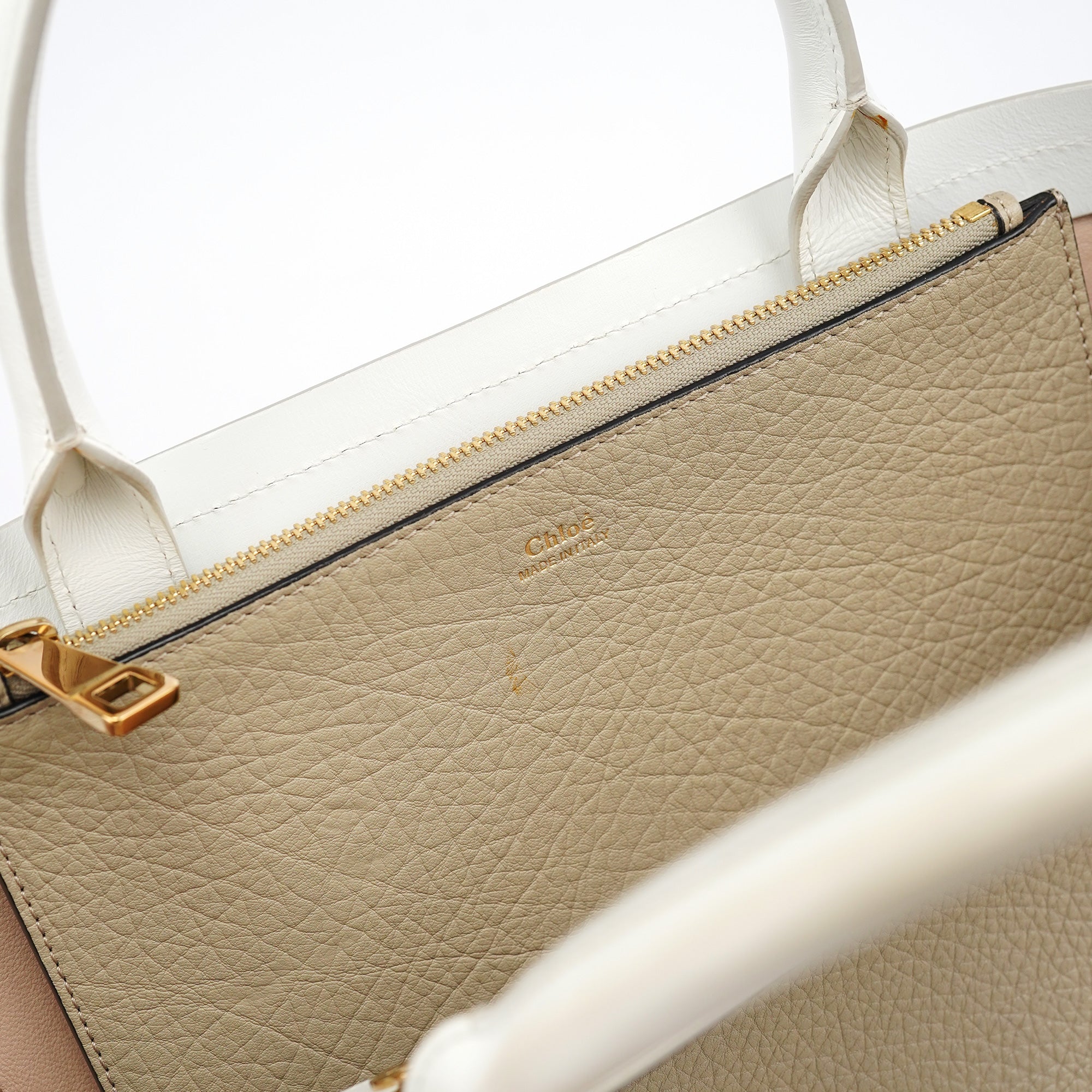 Chloé Sac cabas à fermoirs tournants en cuir beige et blanc