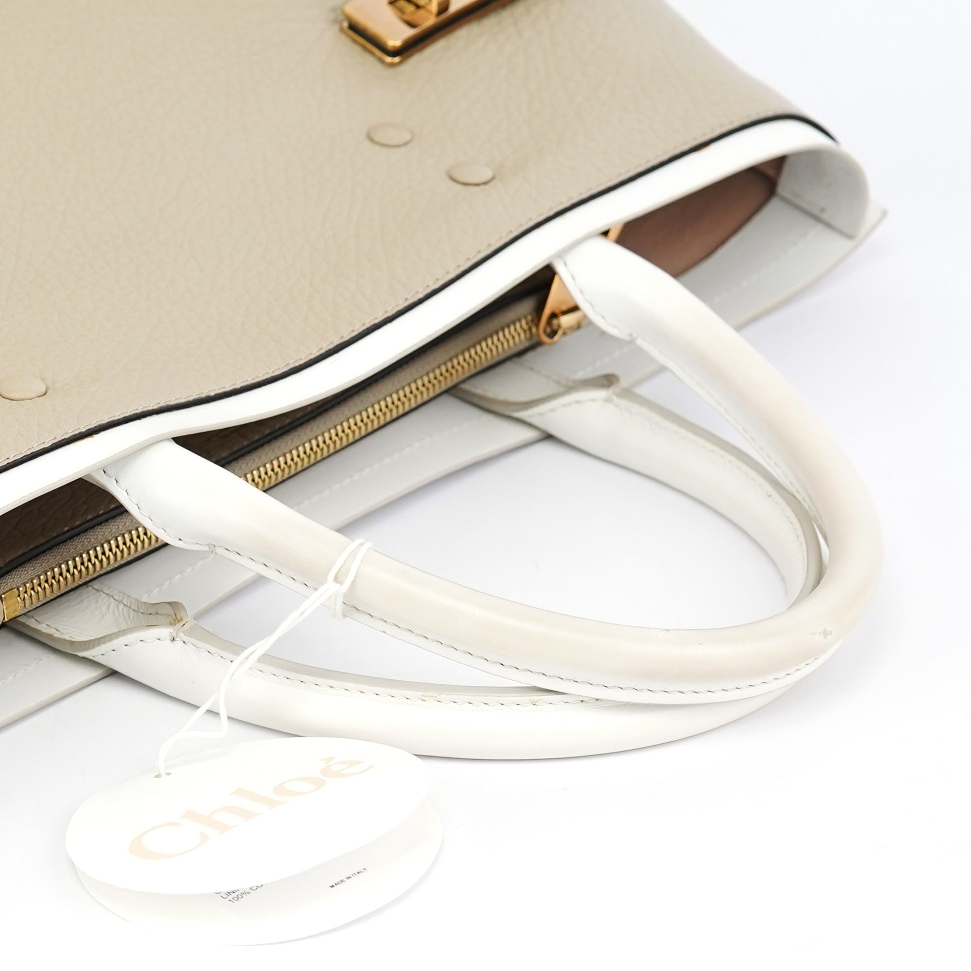 Chloé Sac cabas à fermoirs tournants en cuir beige et blanc