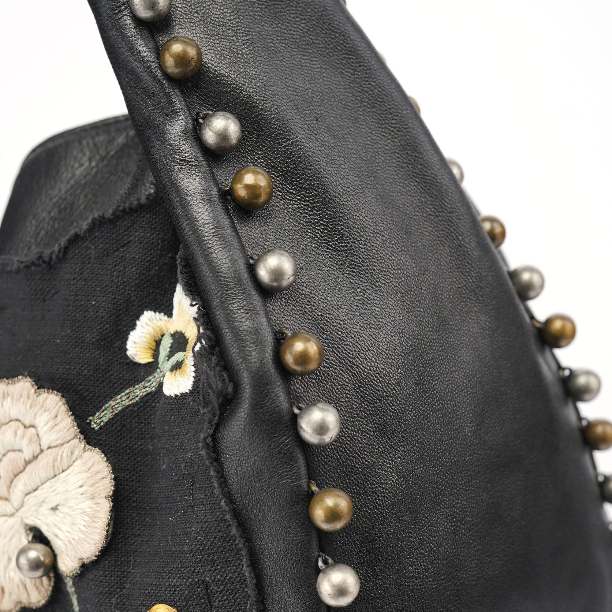Chloé Sac hobo orné en cuir et toile noirs