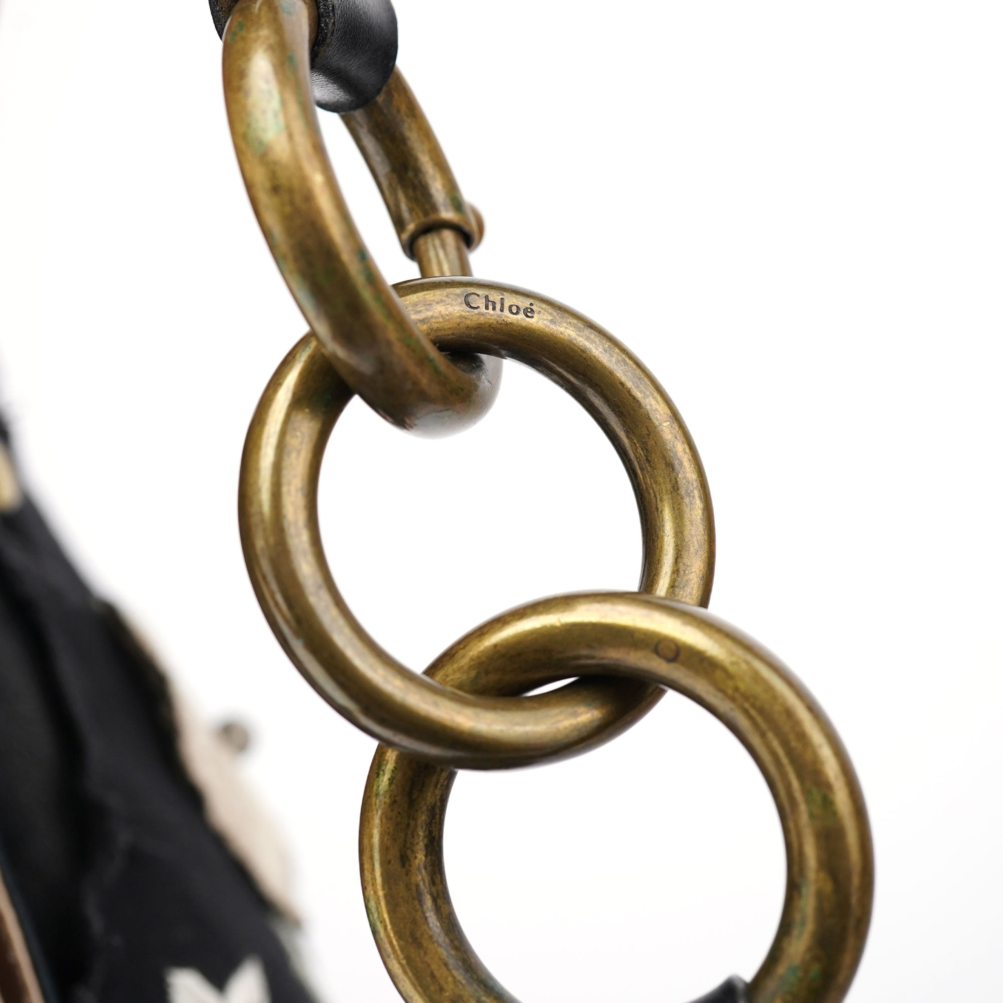 Chloé Sac hobo orné en cuir et toile noirs
