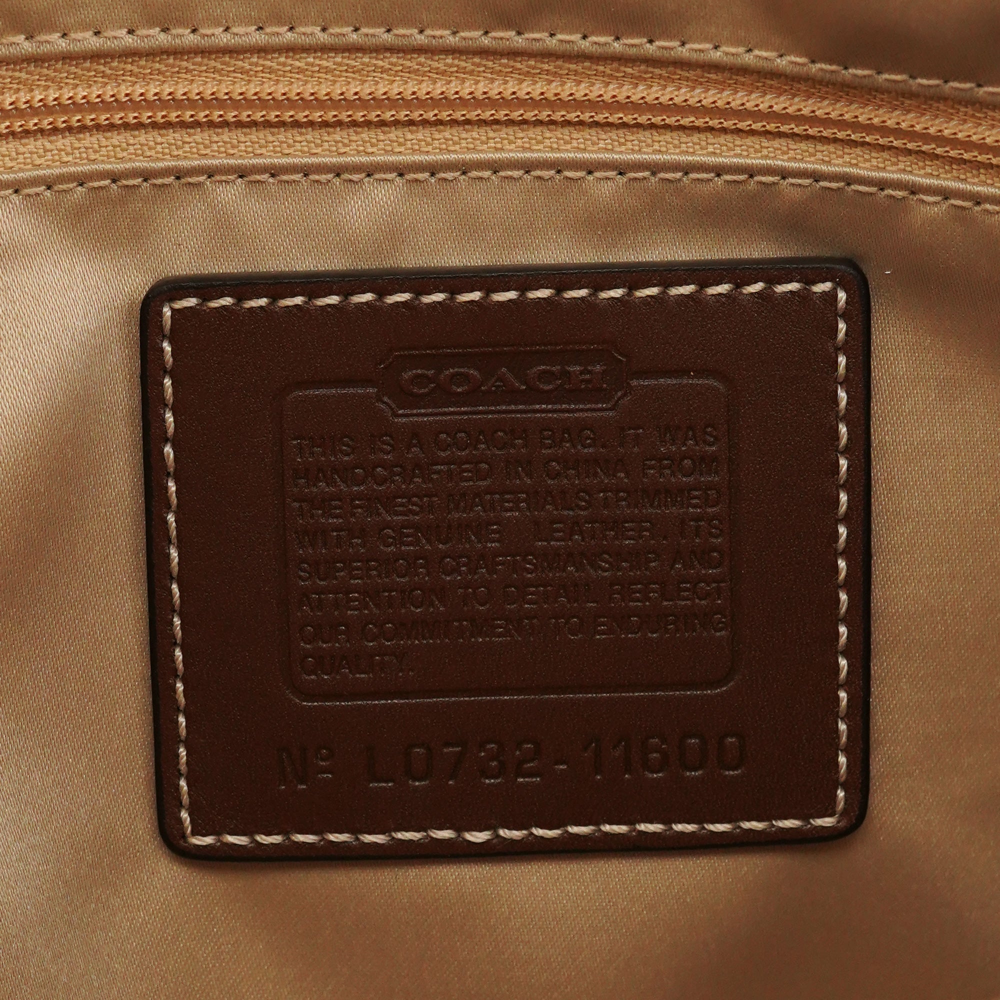 Coach Sac porté épaule en toile Signature beige et dorée
