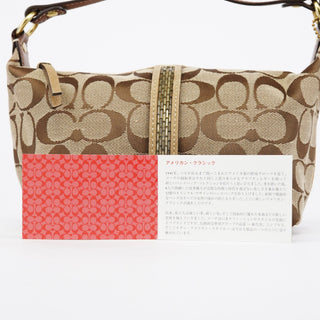 Coach Beige Signature Canvas Mini Hobo bag