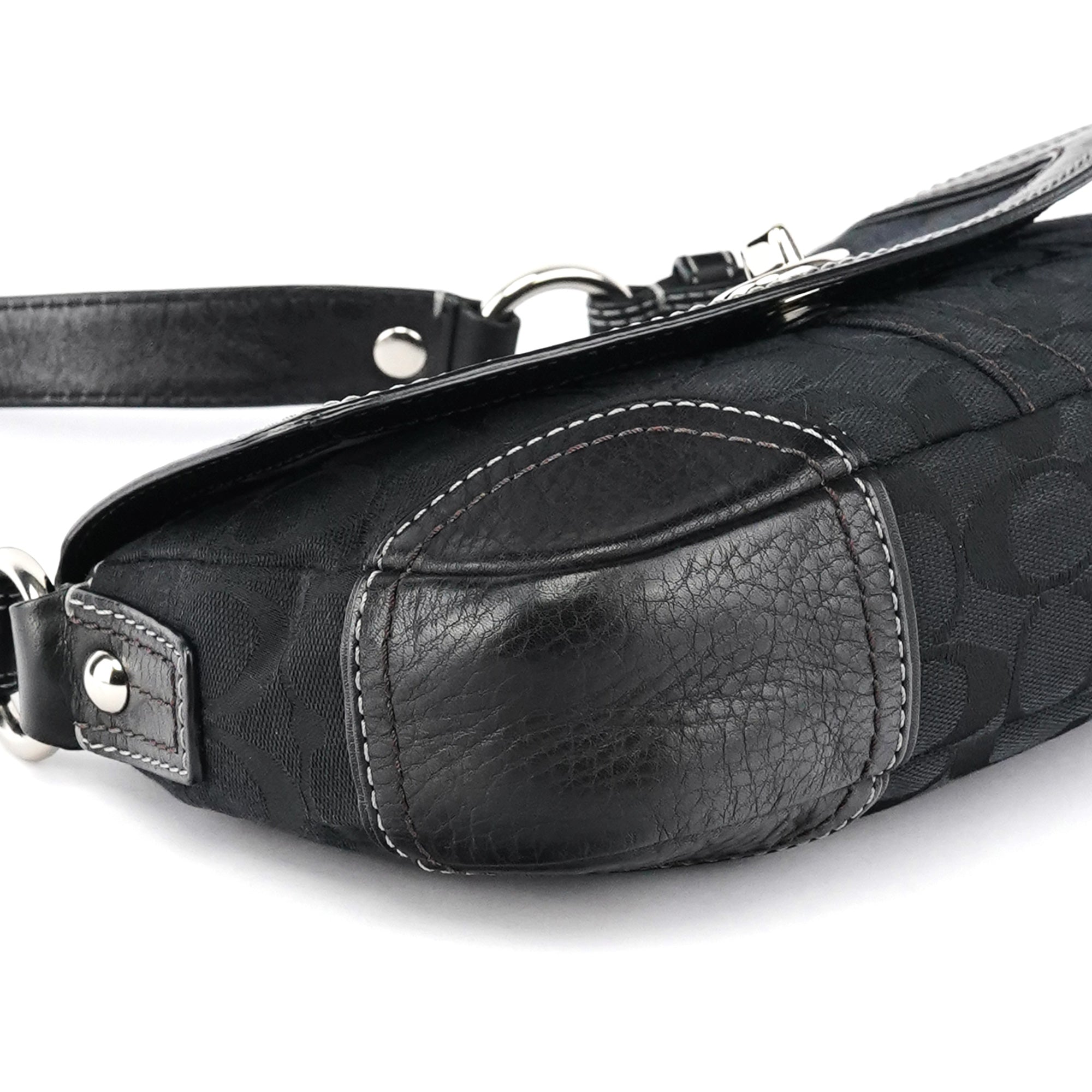 Coach Sac porté épaule à fermoir tournant en toile Signature noire