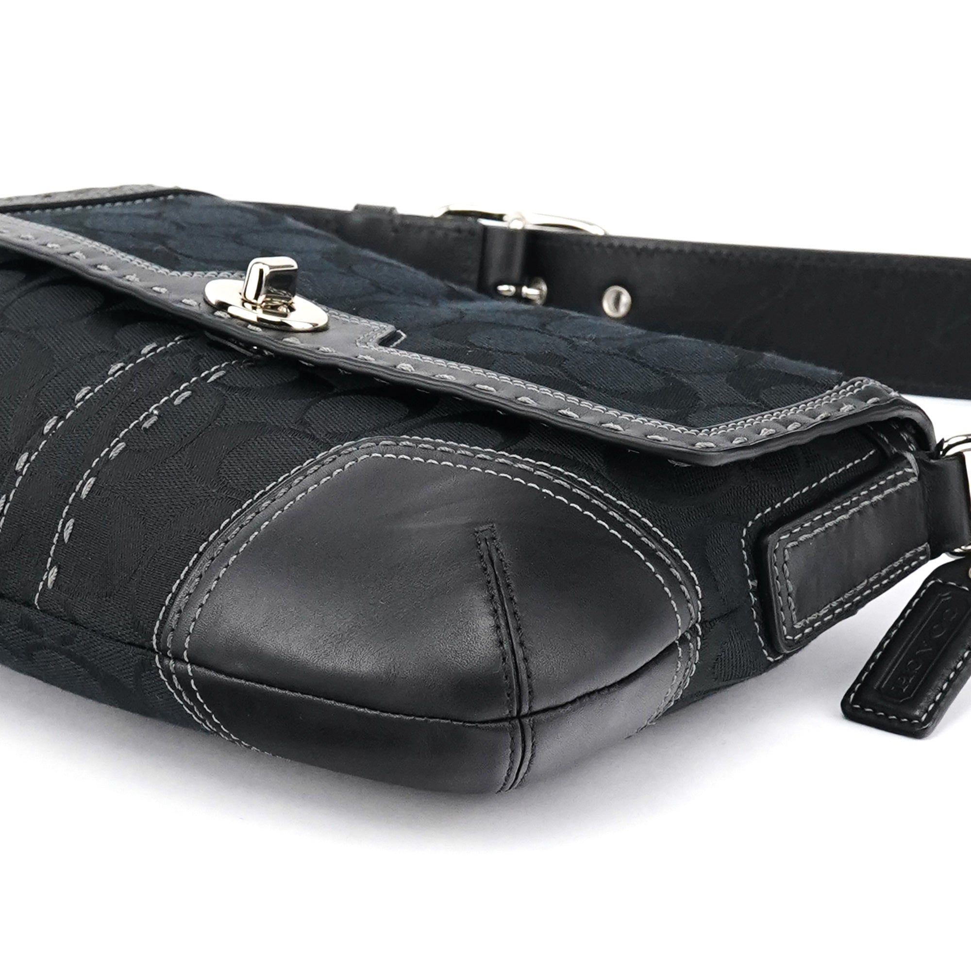 Coach Sac porté épaule à fermoir tournant en toile Signature noire