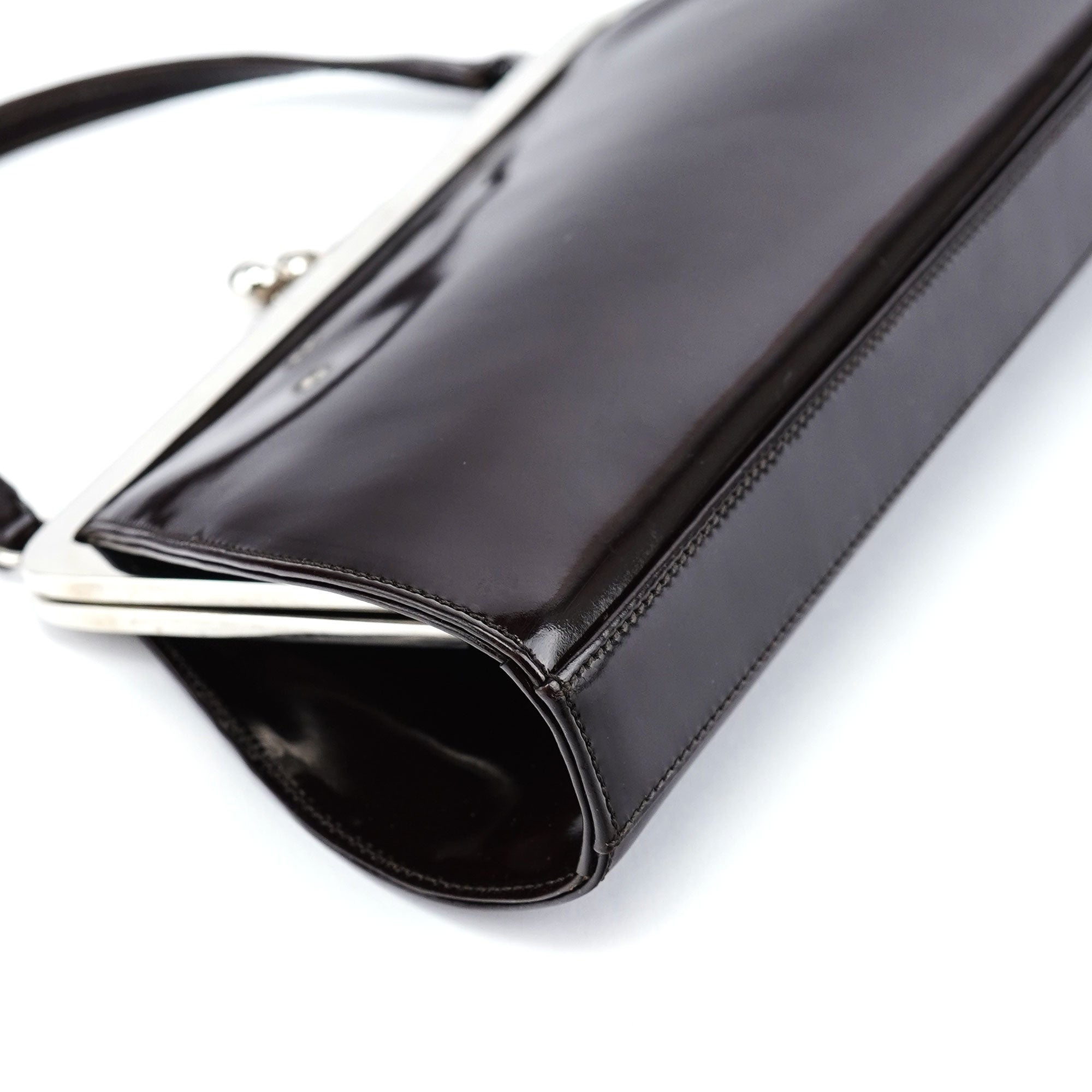 Dolce & Gabbana Sac pochette en cuir verni marron