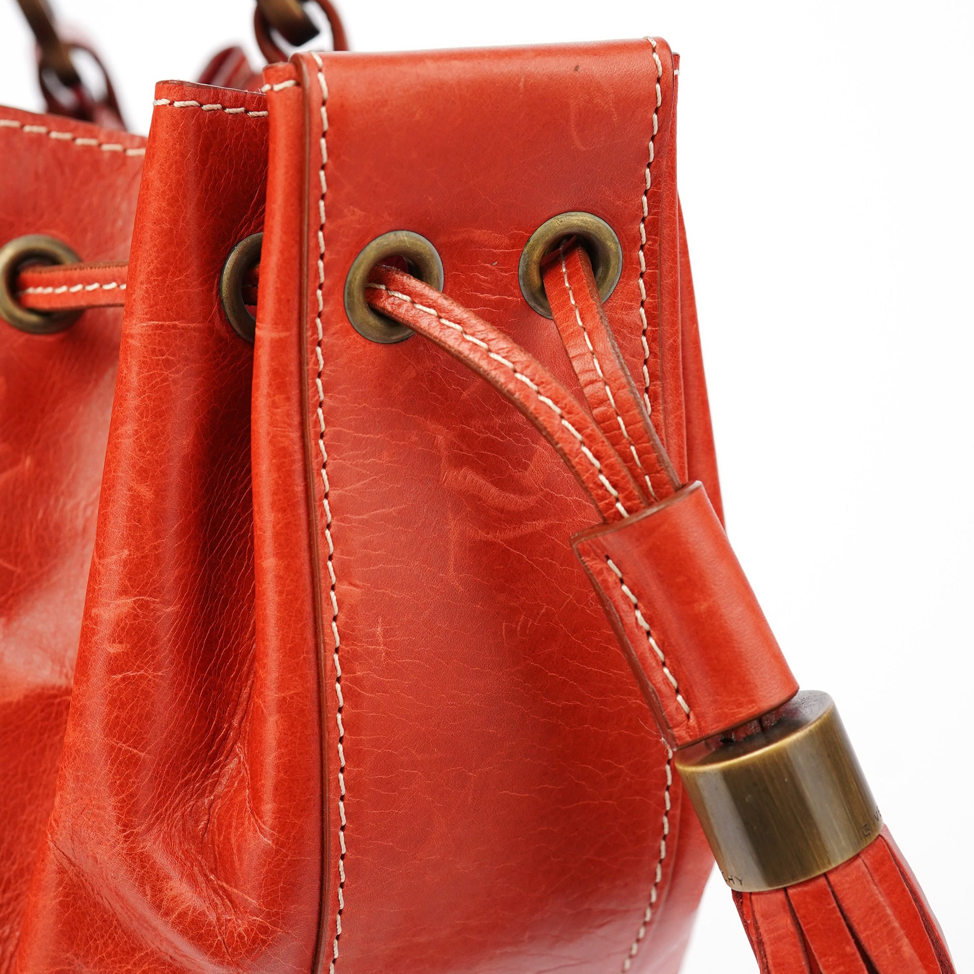Givenchy Sac à pampilles et lien coulissant en cuir de veau orange brûlé