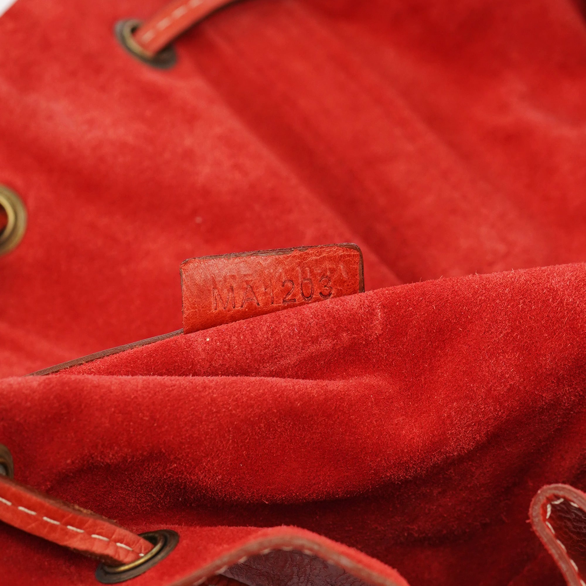 Givenchy Sac à pampilles et lien coulissant en cuir de veau orange brûlé