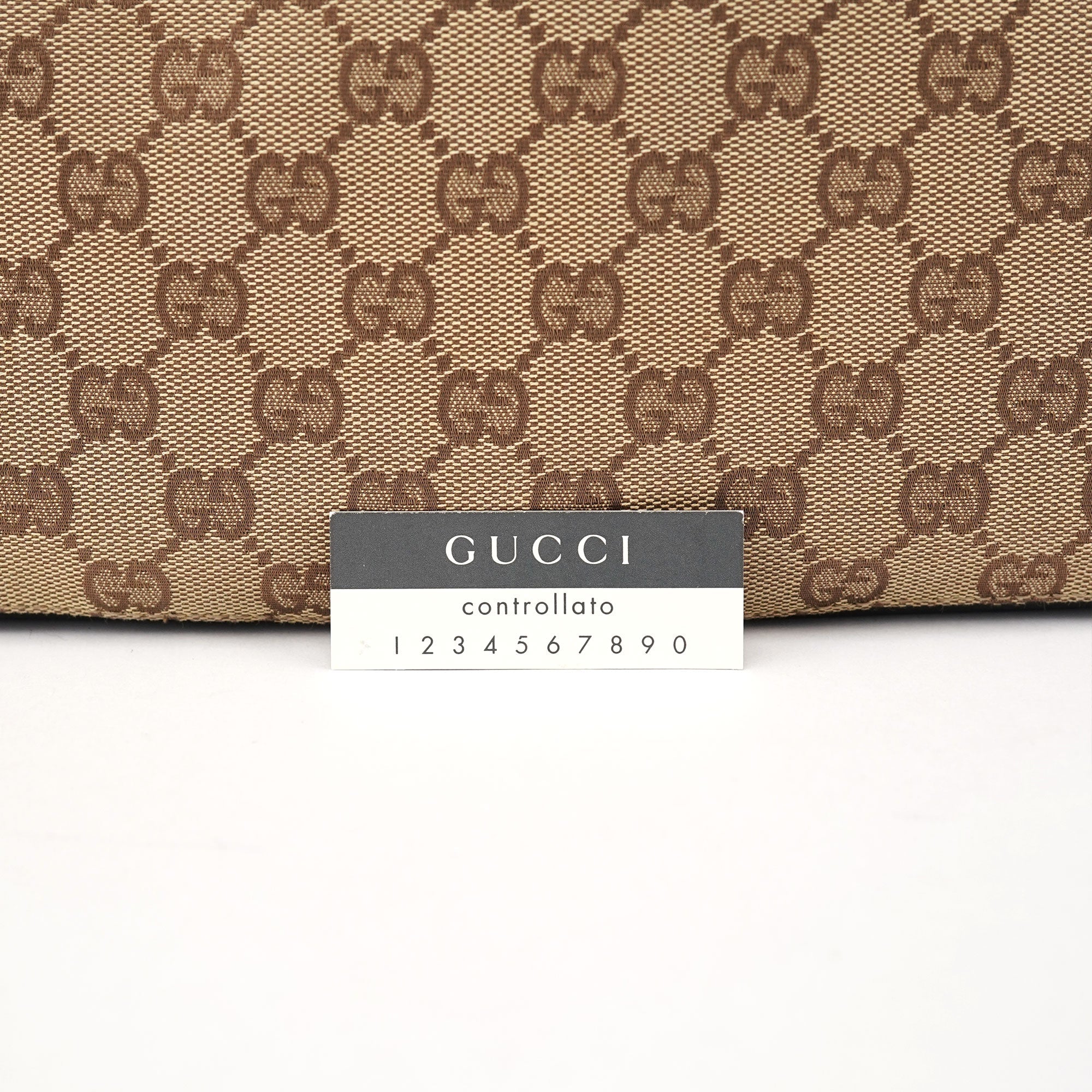 Gucci 001 3748 Sac porté épaule à lien coulissant en toile GG beige
