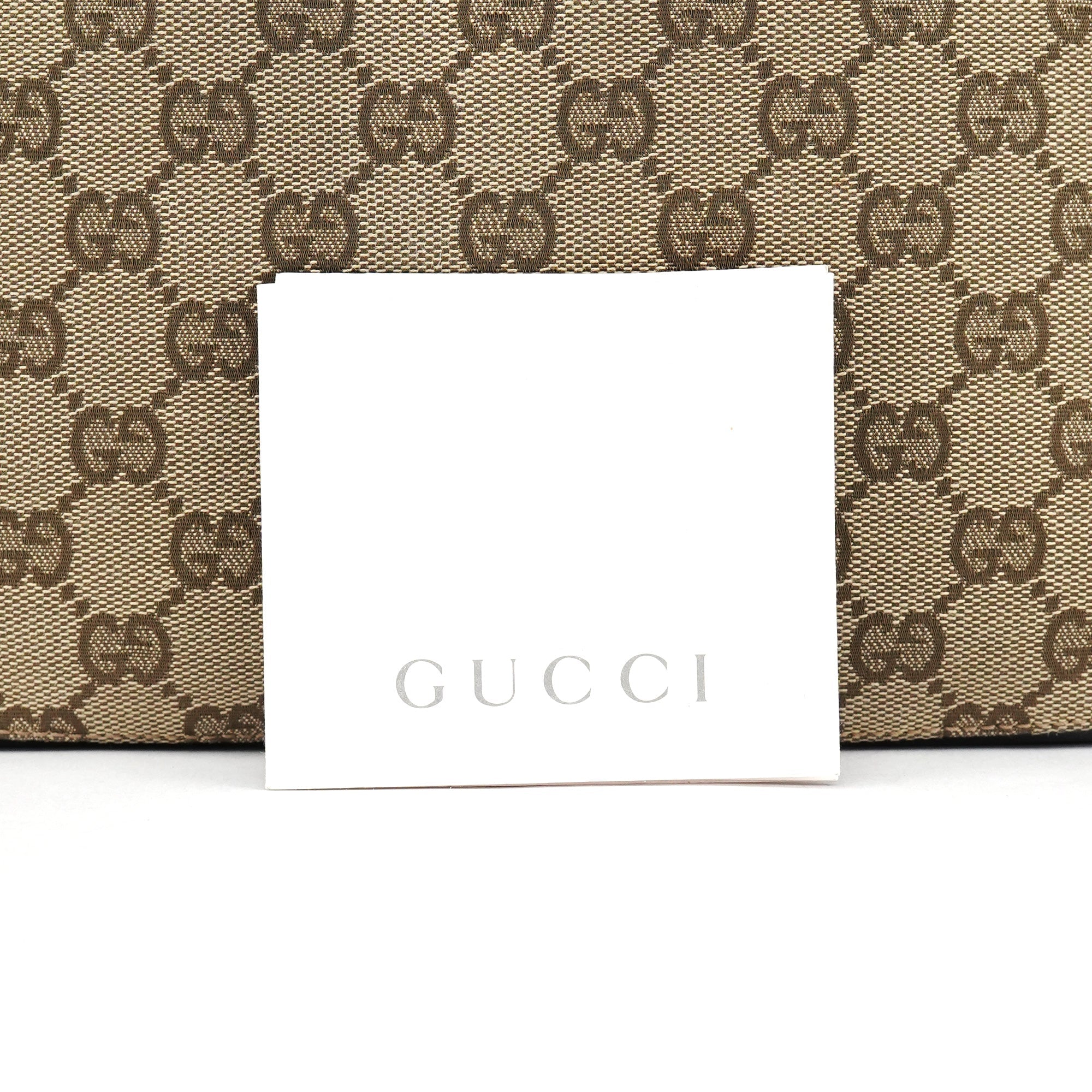 Gucci Schultertasche mit Kordelzug aus beigem GG Canvas