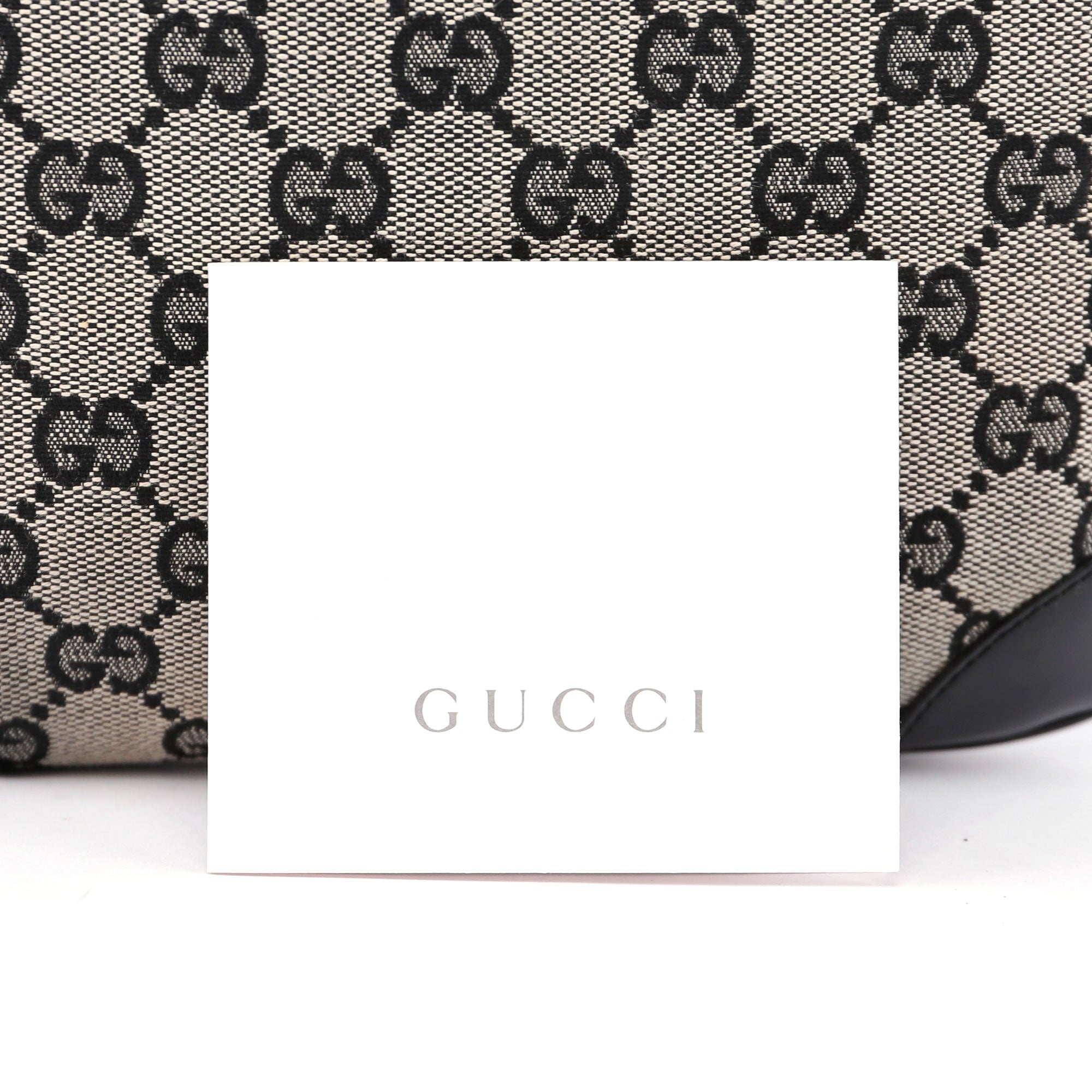 Gucci Sac porté épaule en toile GG beige à finitions en cuir verni
