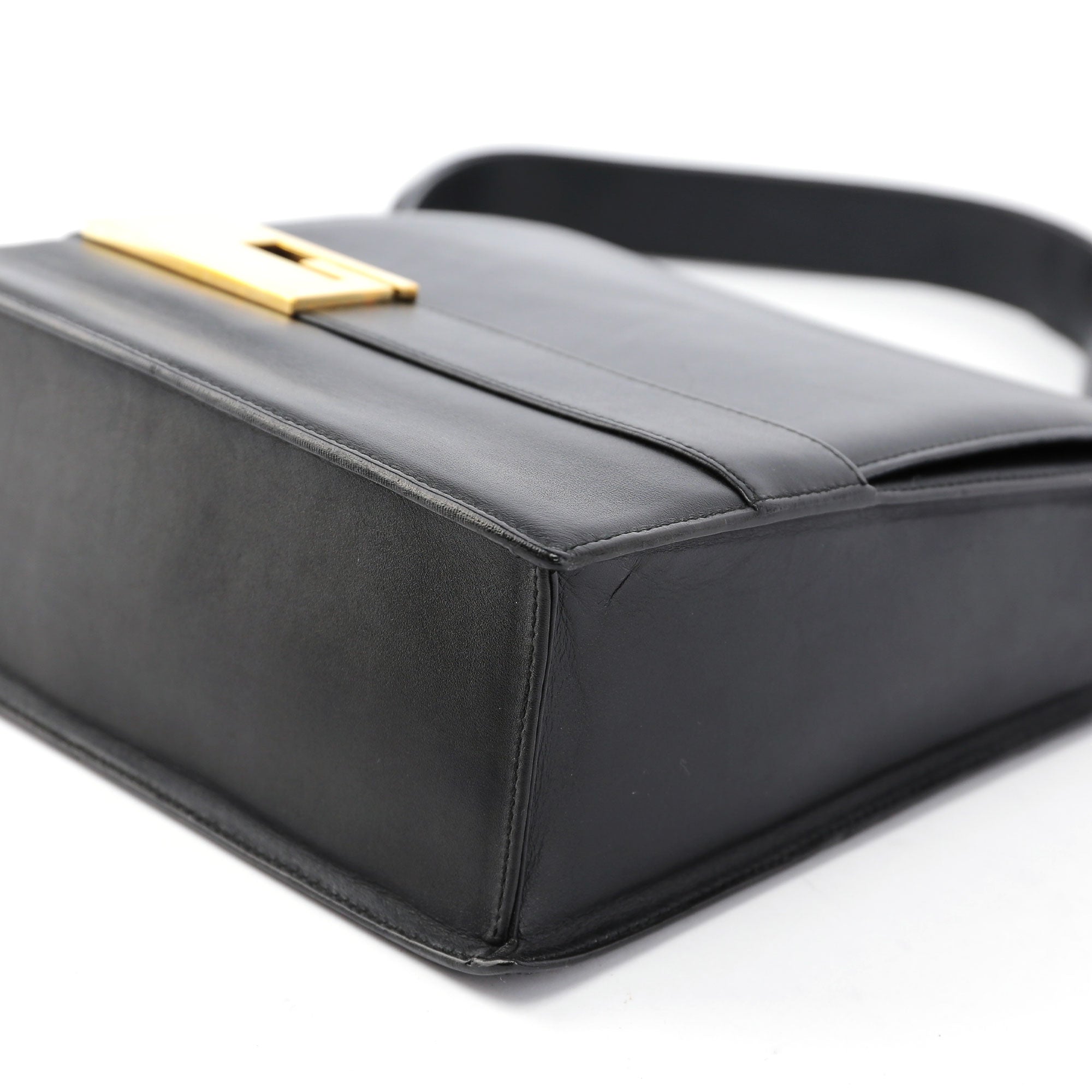Gucci Sac porté épaule en cuir noir à G doré