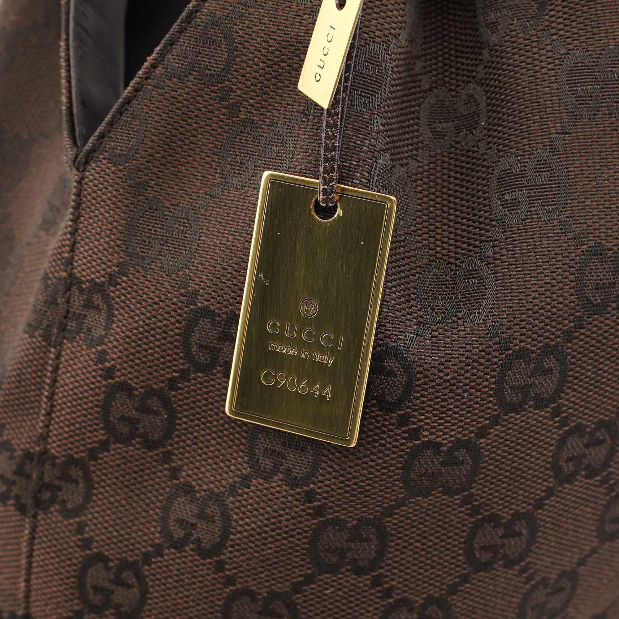 Gucci Sac porté épaule à lien coulissant en toile GG marron