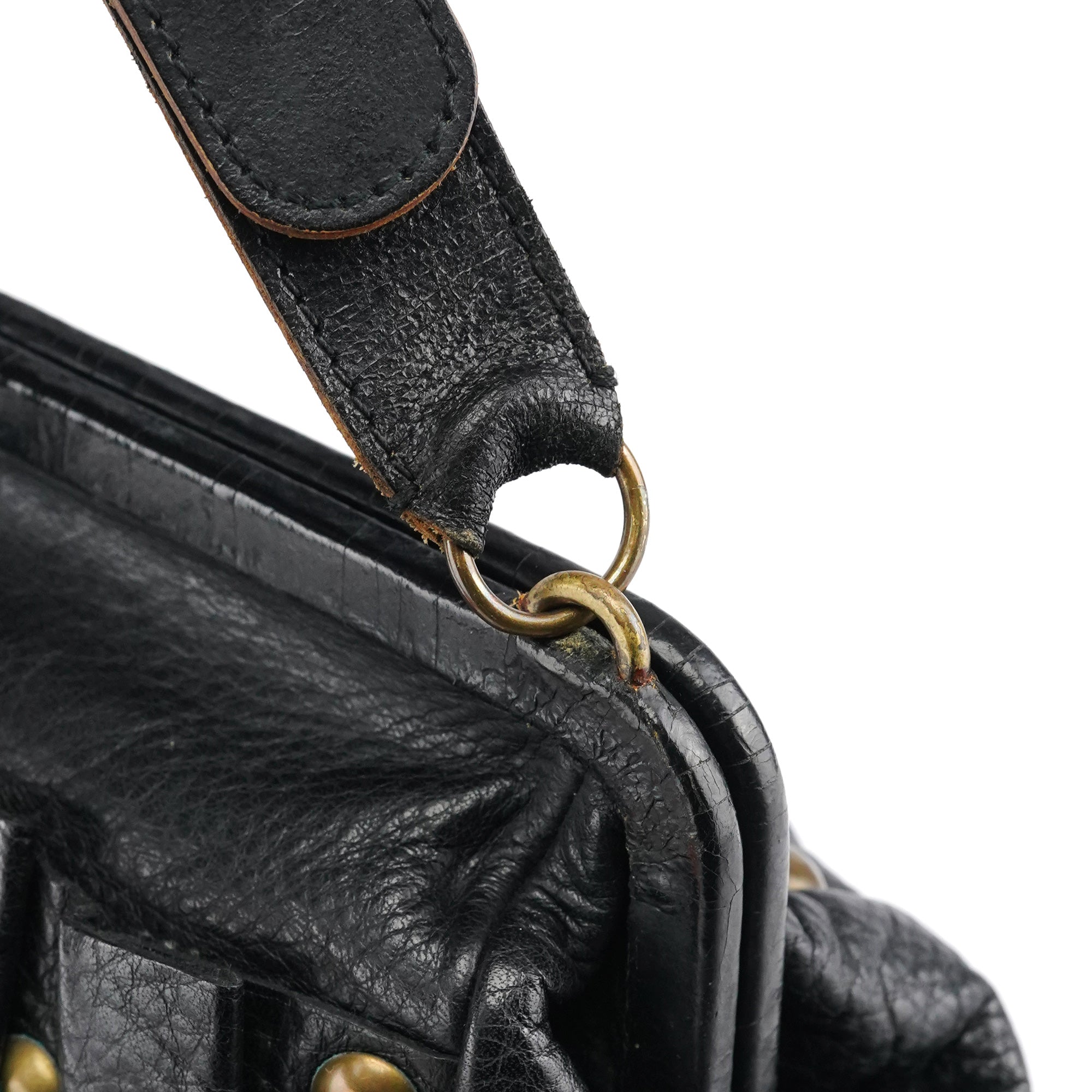Miu Miu Sac à main pochette en cuir noir clouté