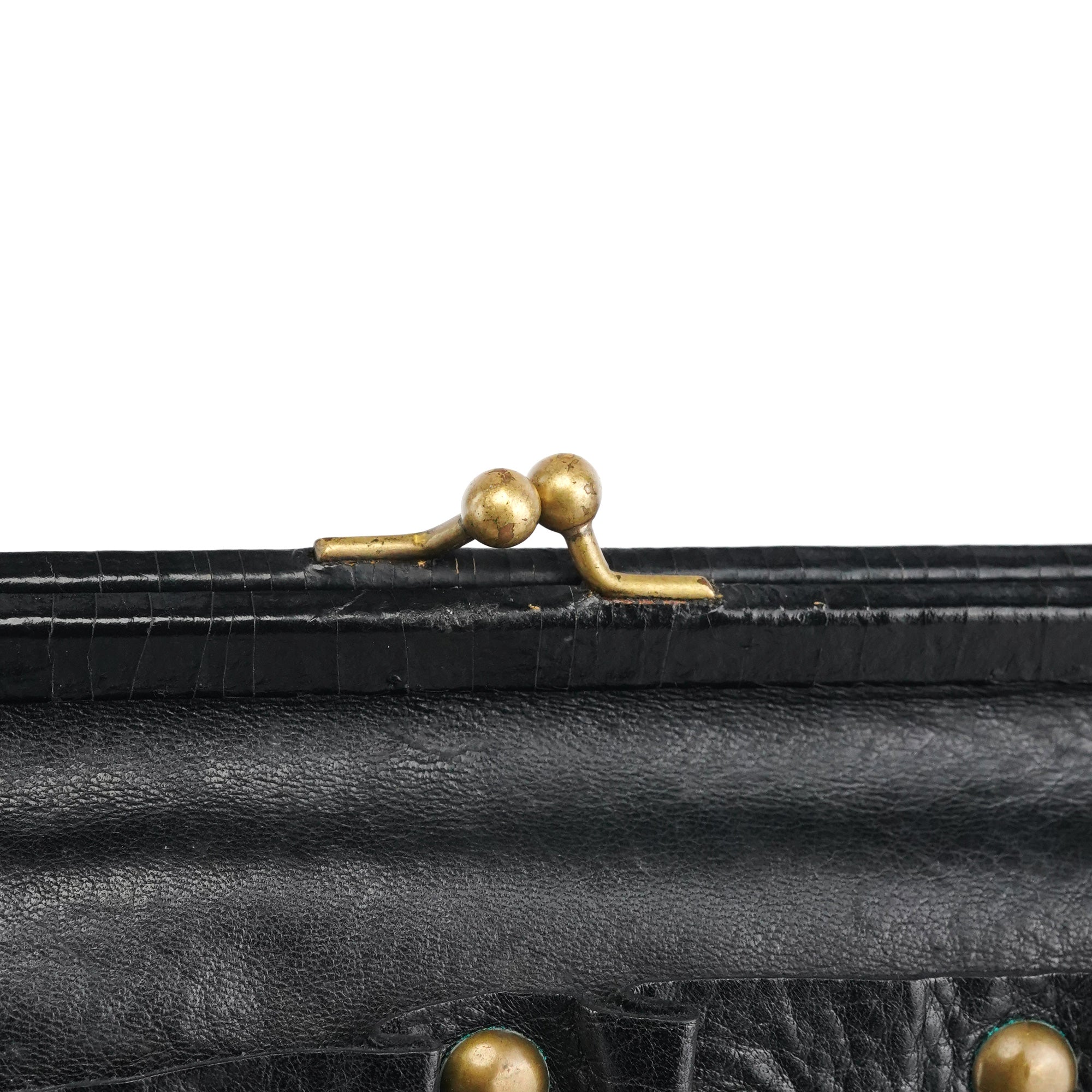 Miu Miu Sac à main pochette en cuir noir clouté