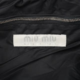 Miu Miu Sac porté épaule à surpiqûres en toile noire et blanche