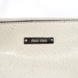 Miu Miu Mini sac hobo en cuir craquelé blanc