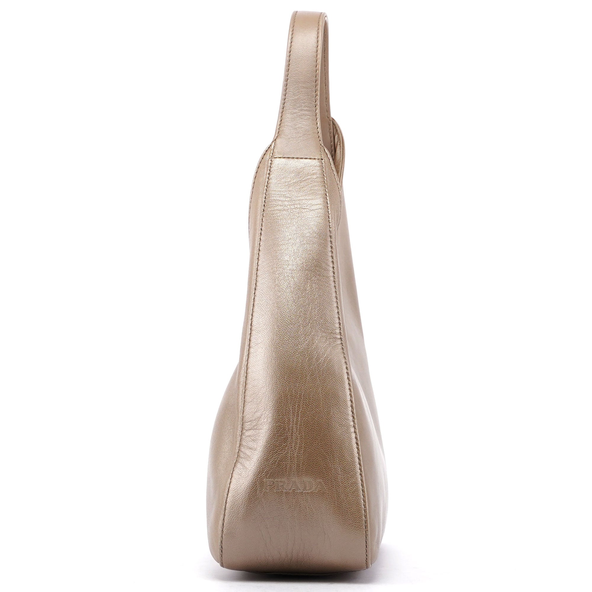 Prada Sac hobo Prada asymétrique en cuir beige