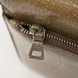 Prada Sac porté épaule à boucle en cuir de lama beige