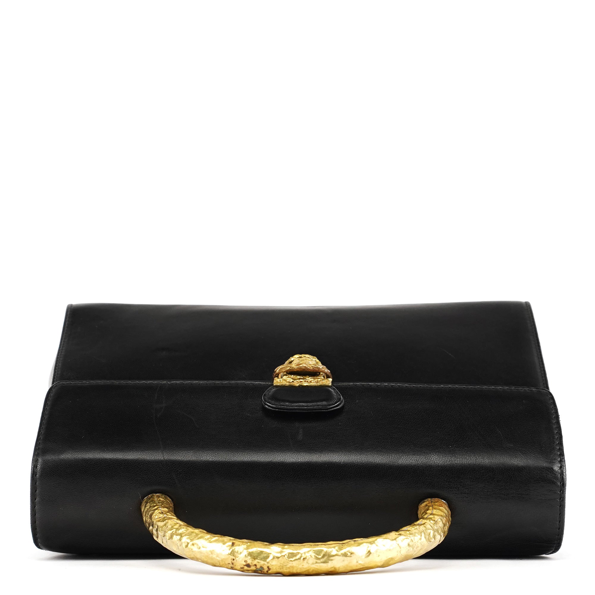 Prada Sac à poignée en cuir noir et métal doré