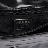 Prada B6711 Sac porté épaule Spazzolato en cuir verni embossé noir