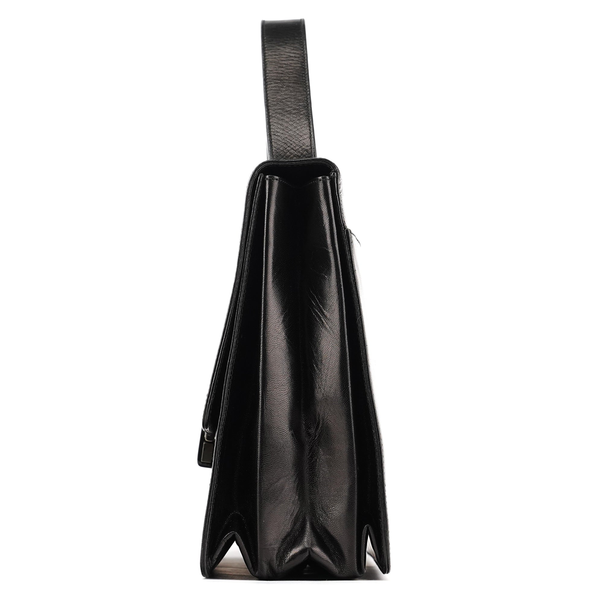 Prada Sac à poignée à boucle en cuir de veau noir
