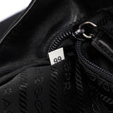 Prada Sac bandoulière en laine et fourrure noires