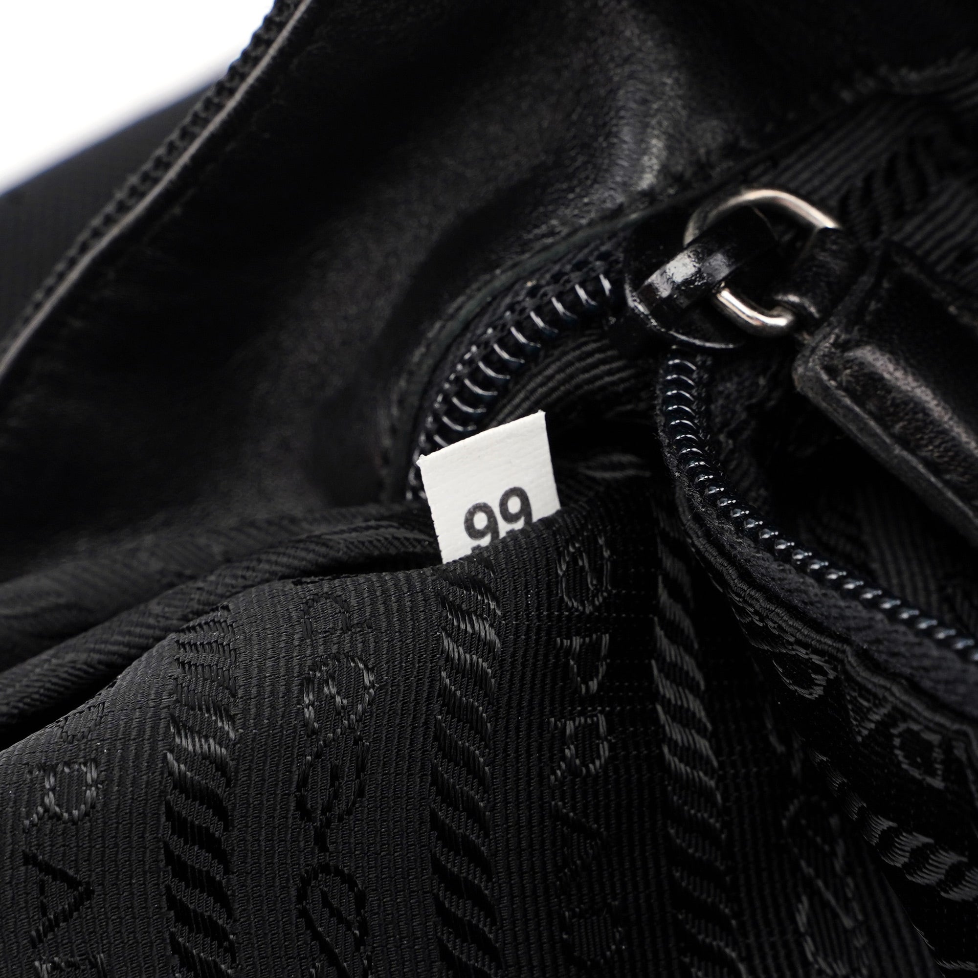 Prada Sac bandoulière en laine et fourrure noires