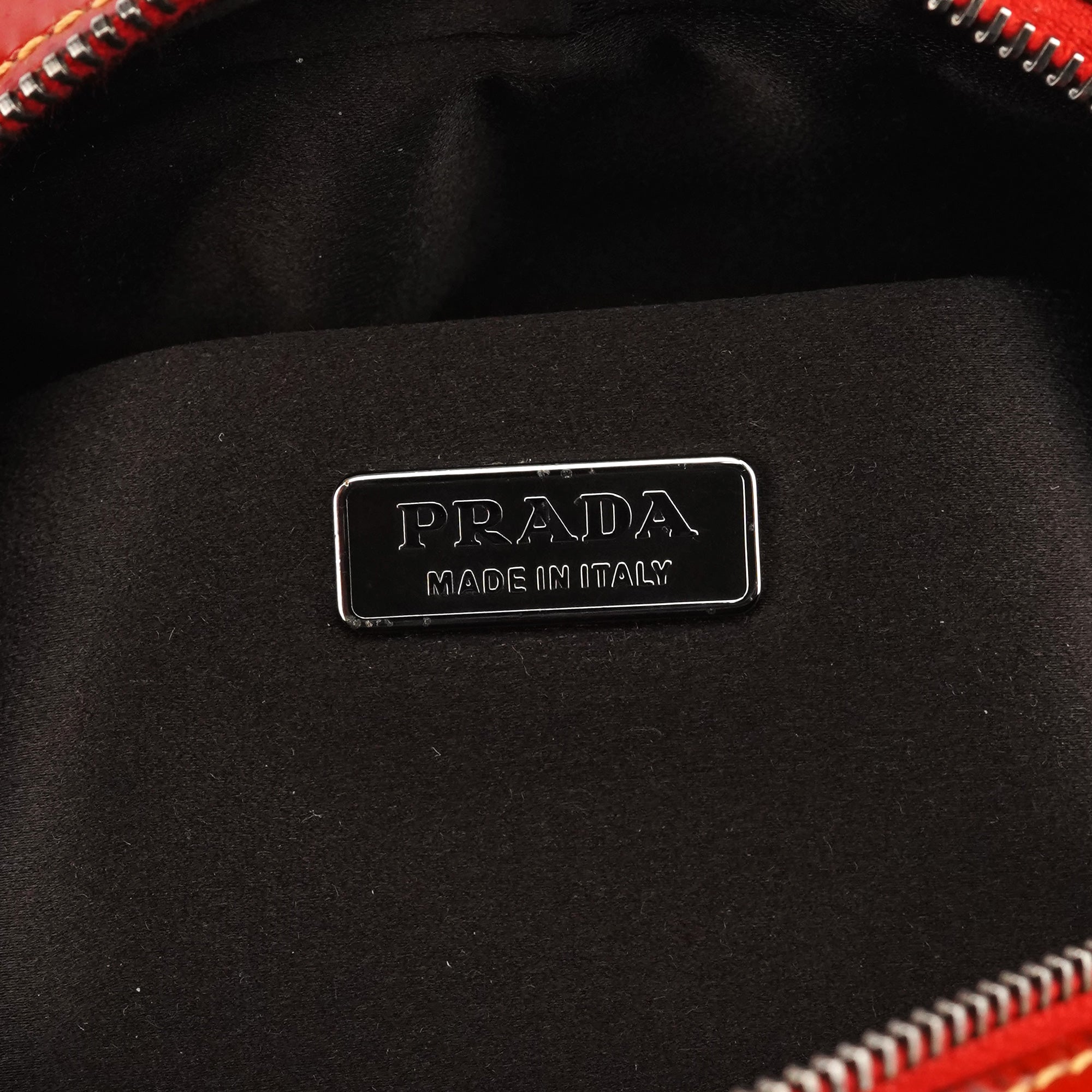 Prada Mini sac bowling Spazzolato en cuir verni rouge