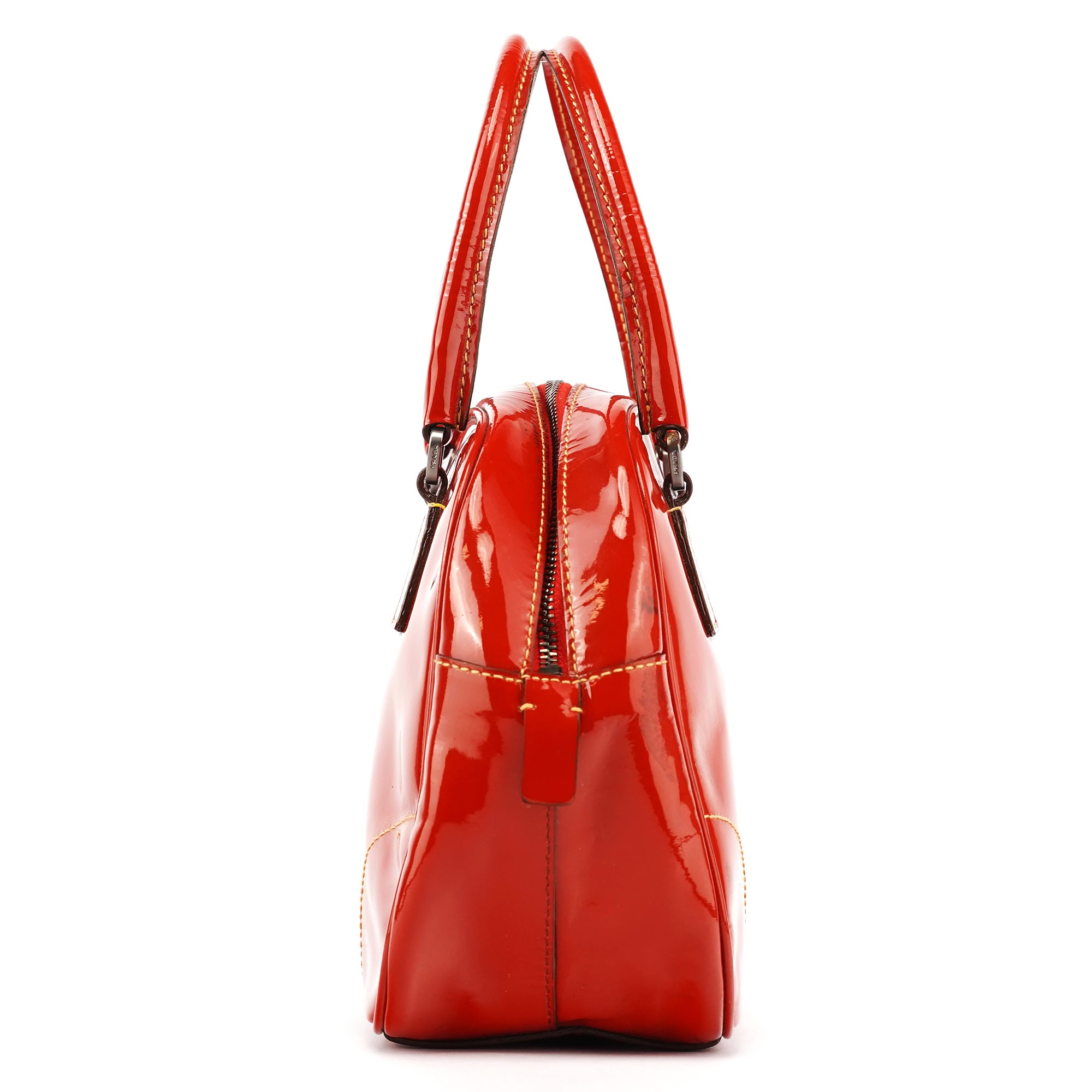 Prada Mini sac bowling Spazzolato en cuir verni rouge